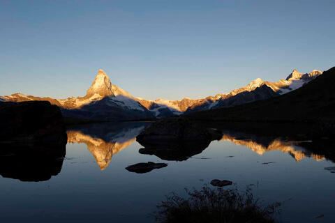 Zermatt Bergbahnen transports guests to the sunrise at Stellisee lake